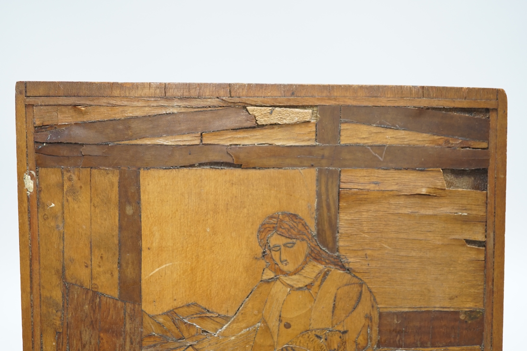 From the Studio of Fred Cuming. An Italian inlaid marquetry panel depicting a shepherd and flock of sheep, 27 x 21cm. Condition - poor
